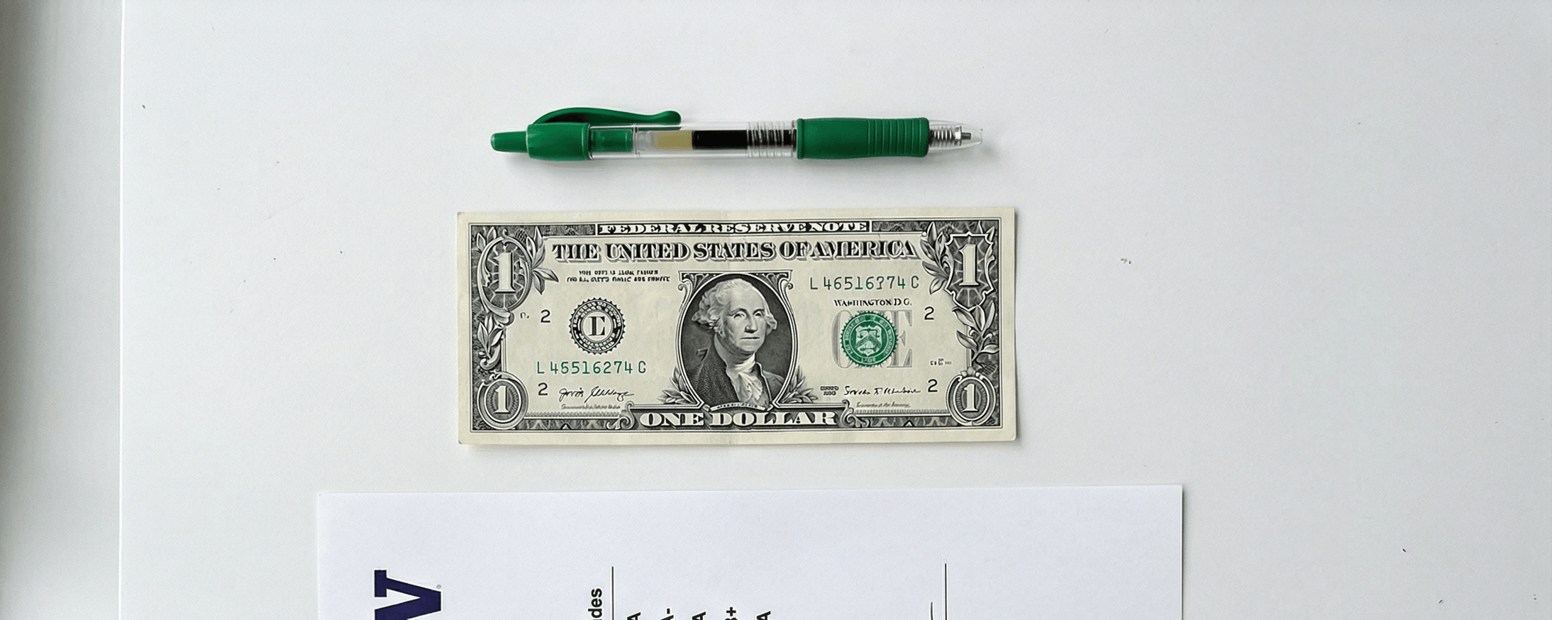 Dollar bill and pen representing your grading report preview